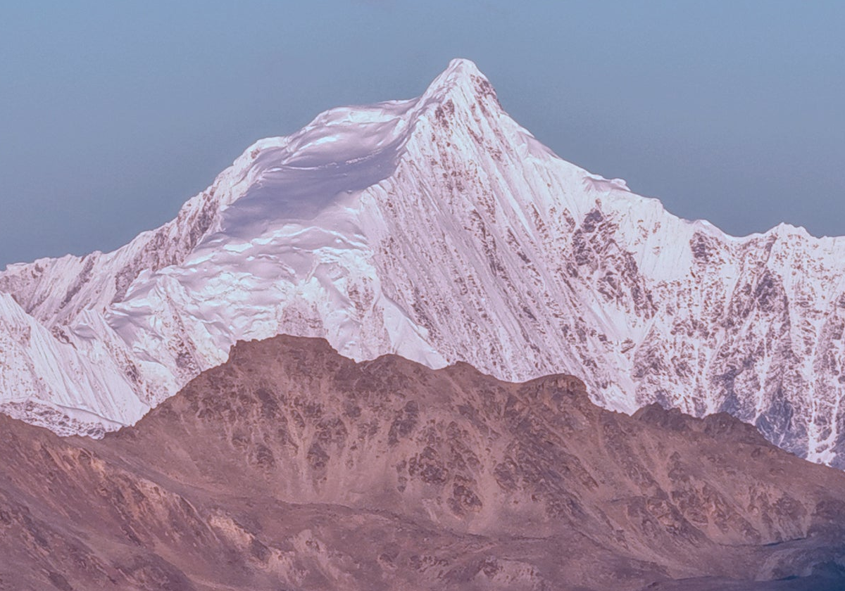 Snow-capped mountain peak with a clear sky