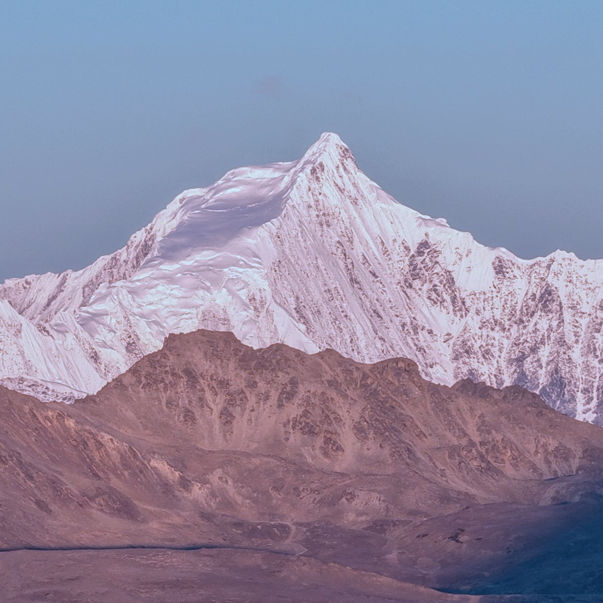 Snow-capped mountain peak with a clear sky