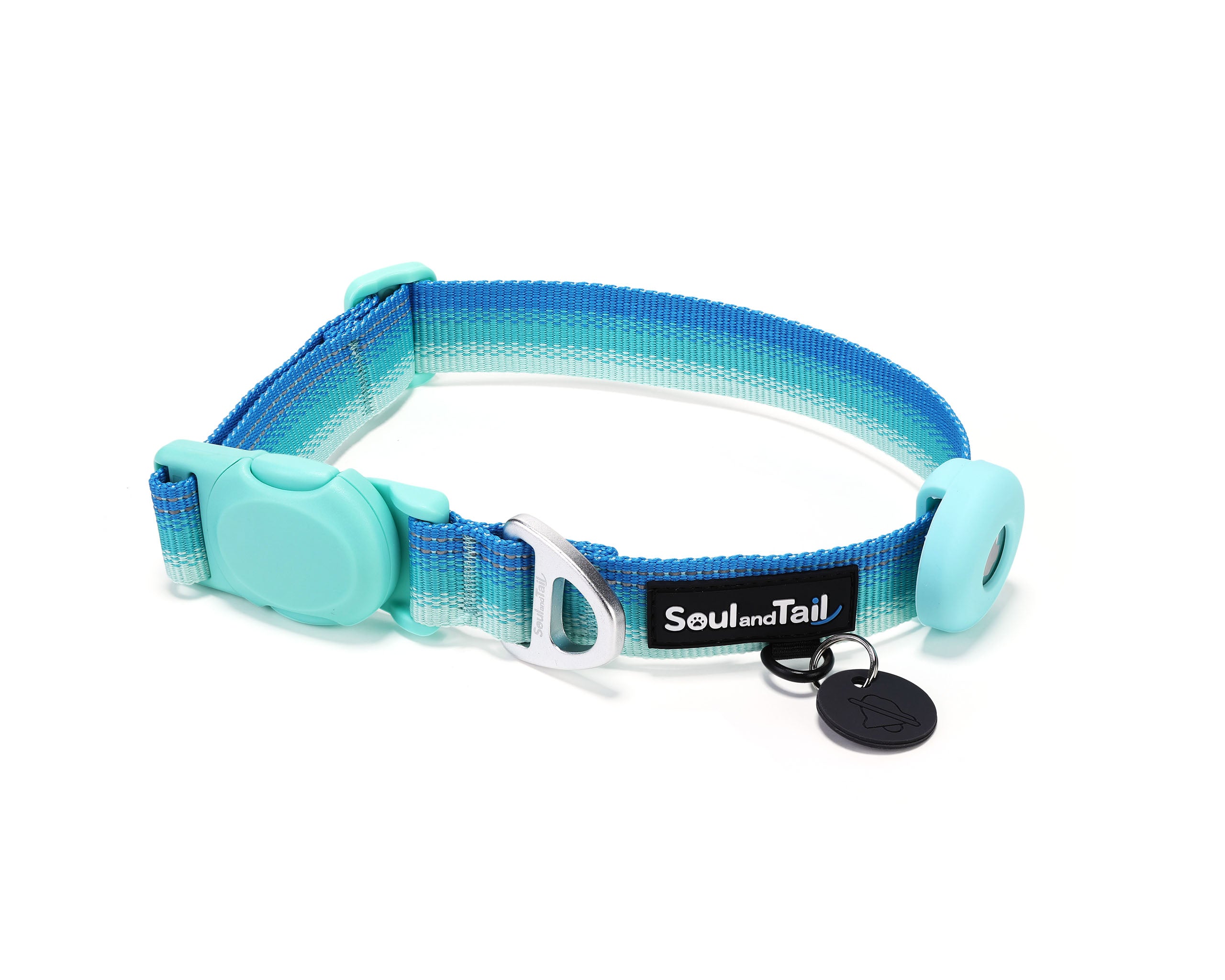 Aqua coast color dog collar with blue and green gradient on its webbing, integrated with a black tag silencer, aluminum ring, silicon airtag holder, assembled by an mint green magnetic buckle on a white background