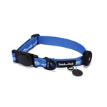 Blue dog collar with frosted peaks pattern on its webbing, integrated with a black tag silencer, aluminum ring, silicon airtag holder, assembled by an blackmagnetic buckle on a white background