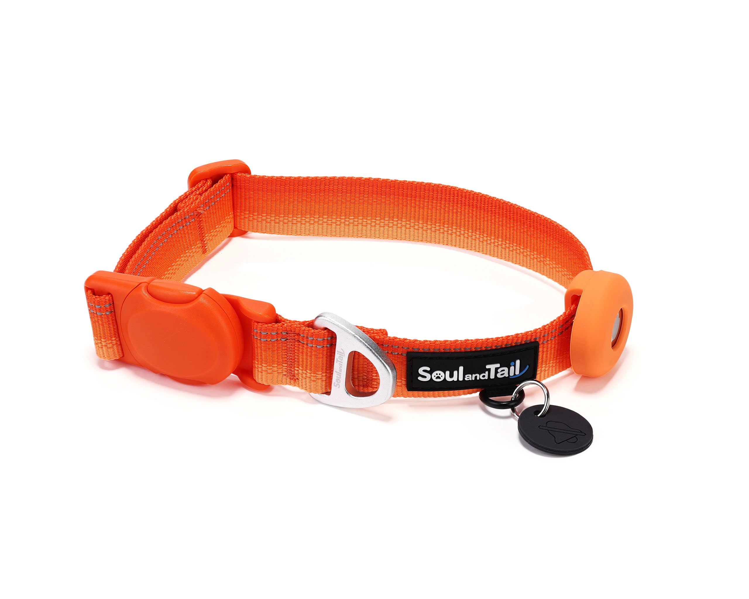 Orange dog collar with a black tag silencer, aluminum ring, silicon airtag holder, assembled by an orange magnetic buckle on a white background