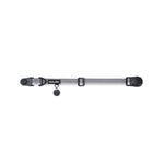 Gray dog collar with a black tag silencer, aluminum ring, silicon airtag holder, with the black magnetic buckle fully opened and lying on a white background