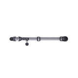 Gray dog collar with a black tag silencer, aluminum ring, silicon airtag holder, with the black magnetic buckle fully opened and lying on a white background