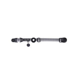 Gray dog collar with a black tag silencer, aluminum ring, silicon airtag holder, with the black magnetic buckle fully opened and lying on a white background