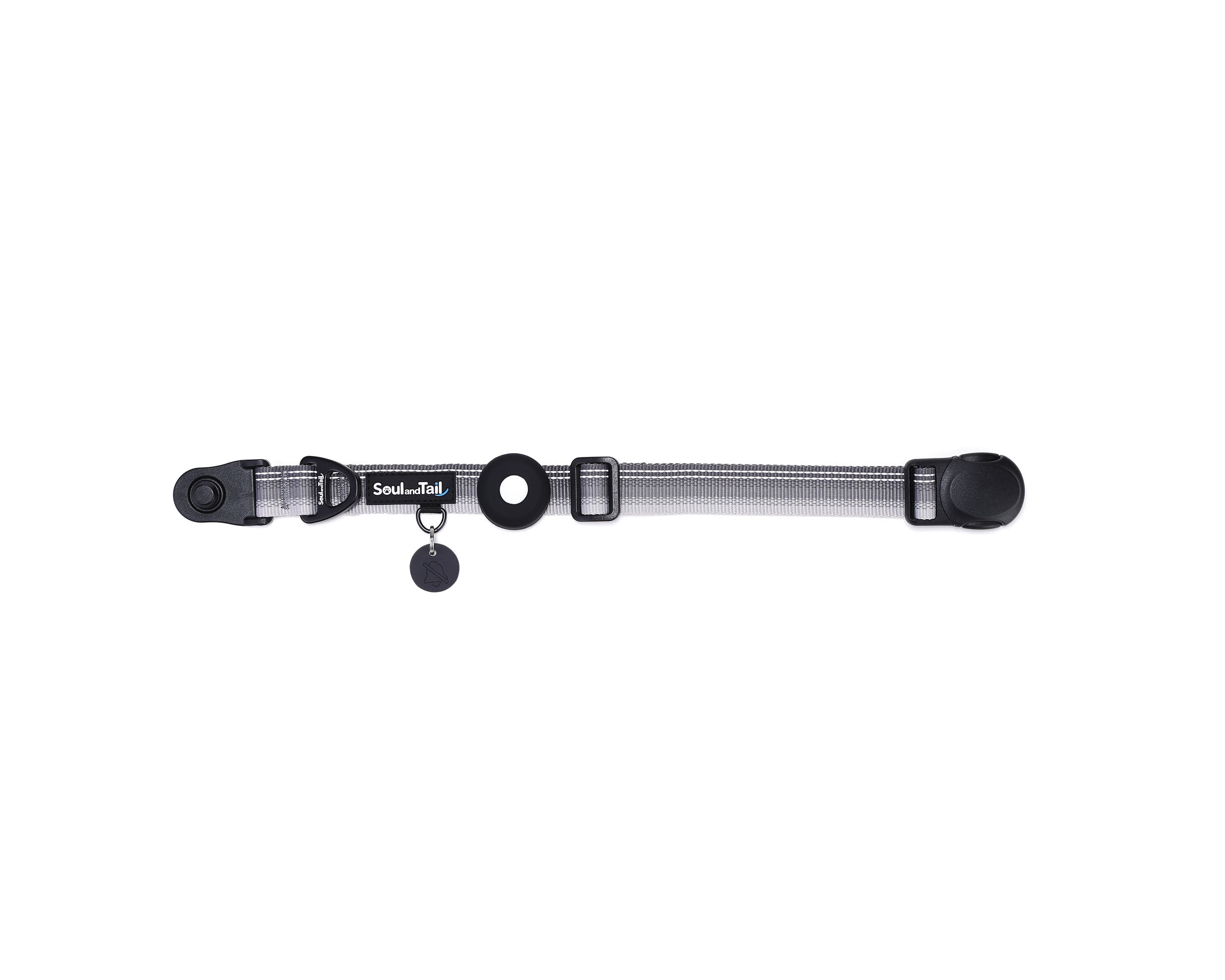 Gray dog collar with a black tag silencer, aluminum ring, silicon airtag holder, with the black magnetic buckle fully opened and lying on a white background
