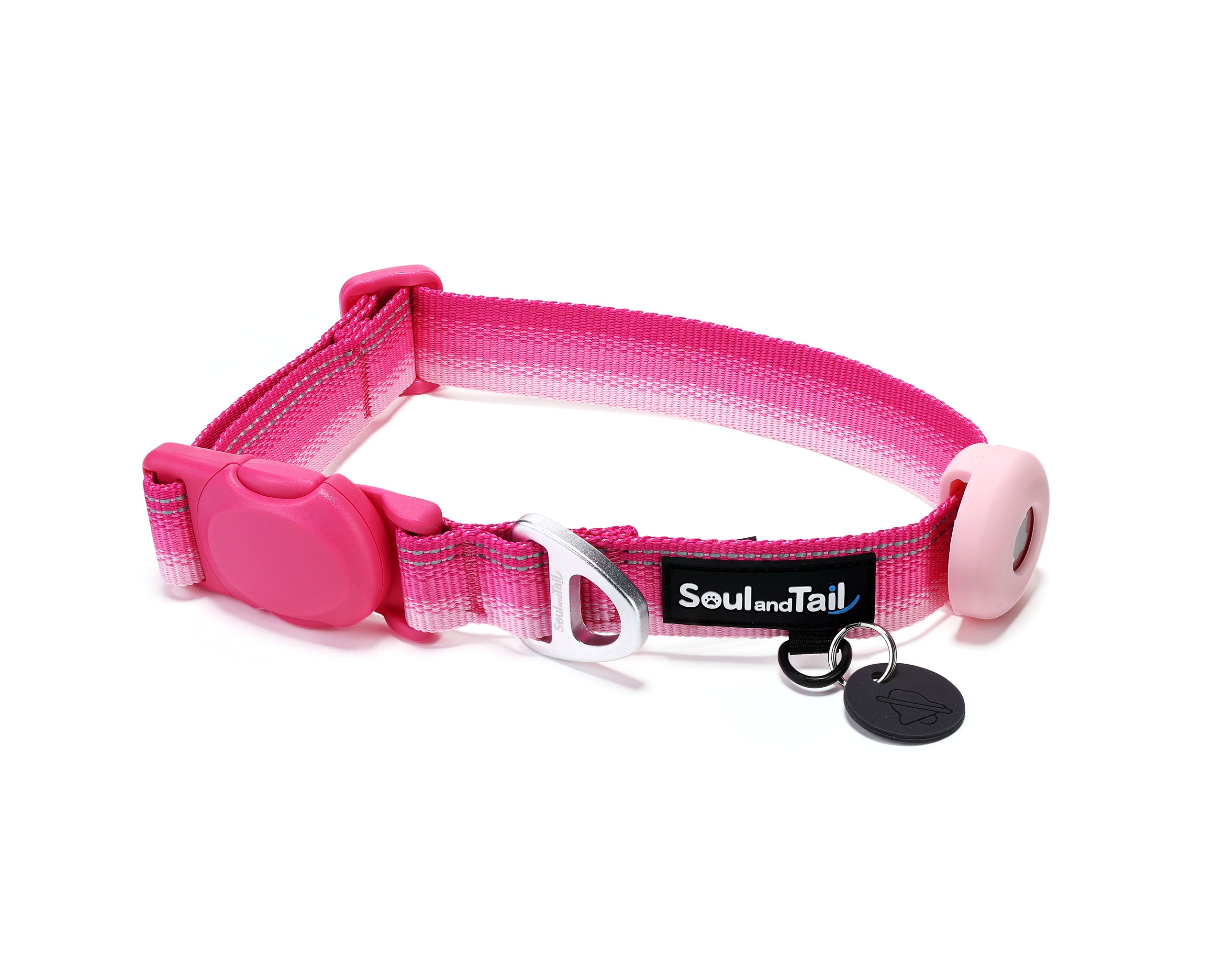 Pink dog collar with a black tag silencer, aluminum ring, silicon airtag holder, assembled by a pink magnetic buckle on a white background
