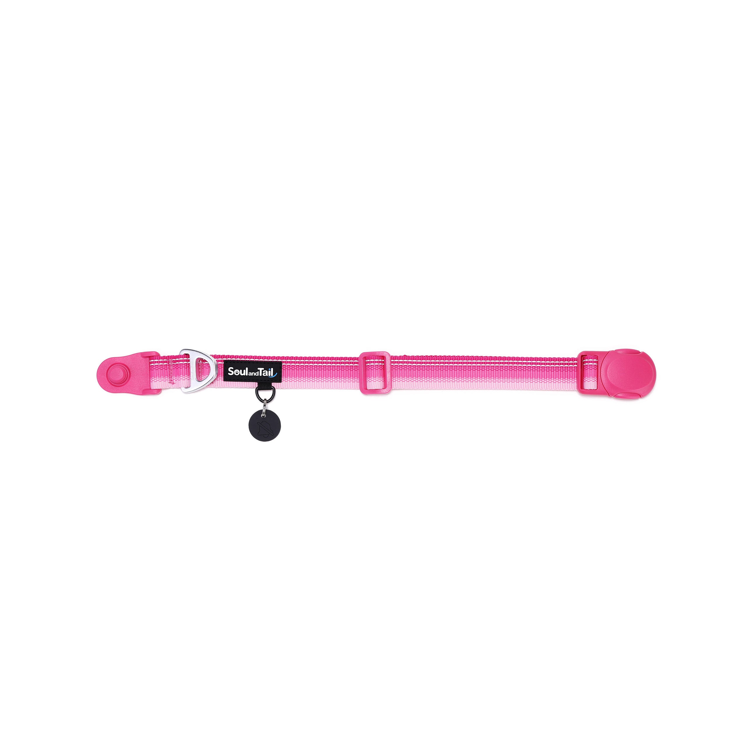 Pink dog collar with a black tag silencer, aluminum ring, silicon airtag holder, with the pink magnetic buckle fully opened and lying on a white background