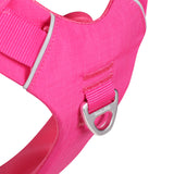 Close-up of a pink dog harness with an aluminum front ring with the logo "Soul and Tail" on a white background