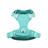 Turquoise dog harness with 'Soul and Tail' branding, with two mint green magnetic buckle on each of the sides, a mint green vegan leather handle, and a aluminum ring, on a white background
