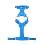 Blue dog harness, with its magnetic buckle fully opened, lying flat on a white background