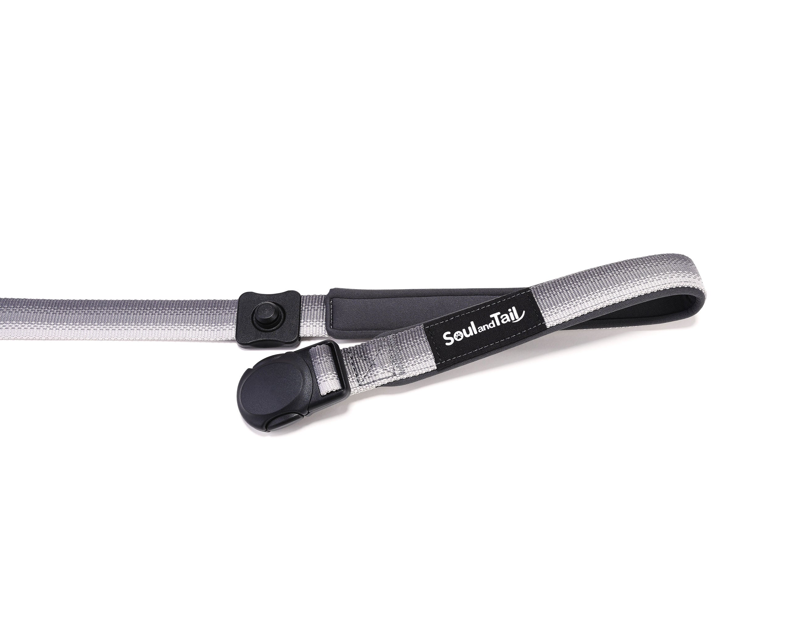 Gray dog leash with black magnetic buckle and 'Soul and Tail' branding on a white background