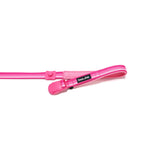 Pink dog leash with a opned magnetic buckle lying flat on a white background